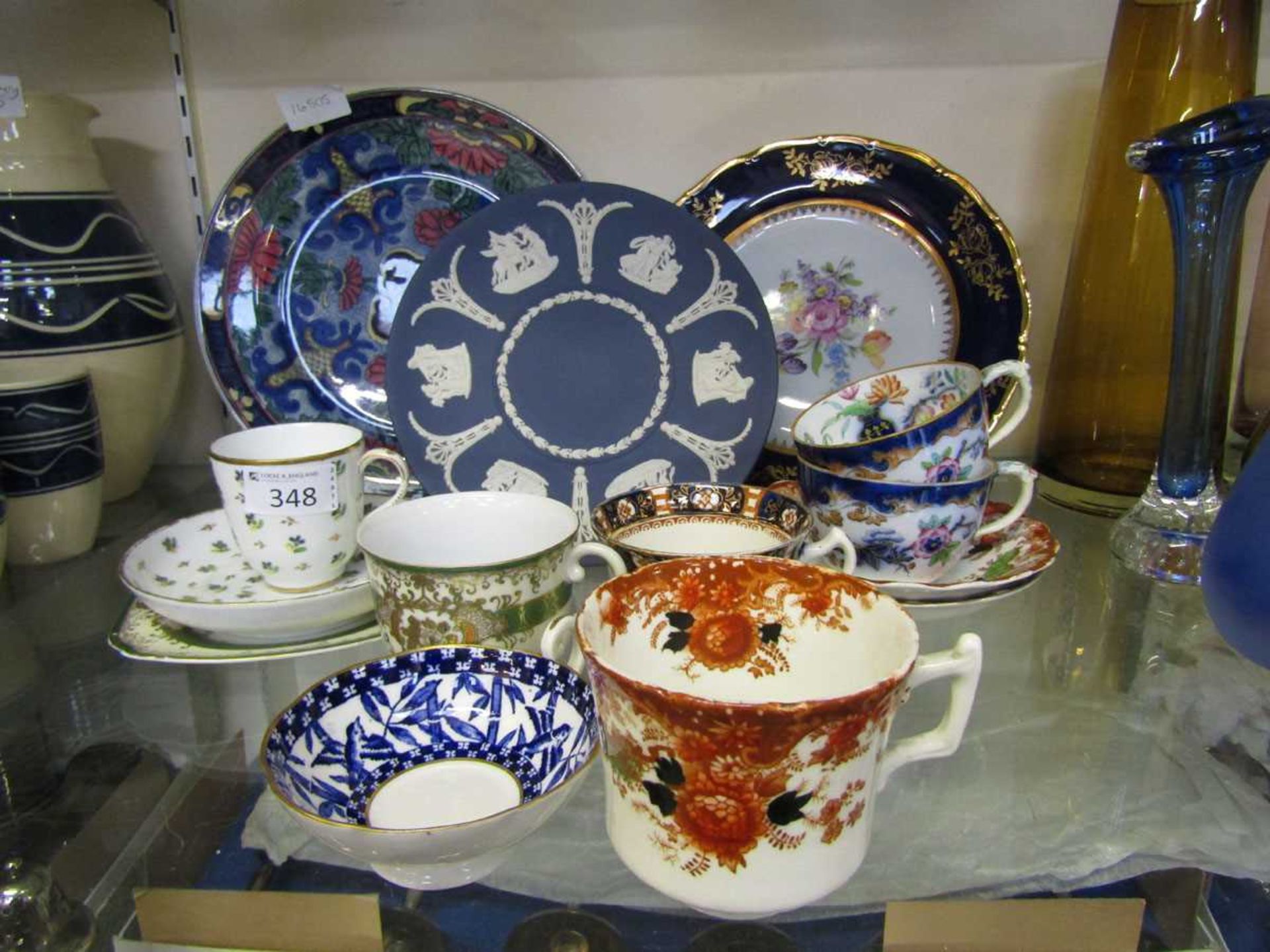 An assortment of mixed ceramic tableware to include Wedgwood Jasperware plate, cups, saucers, bowls,