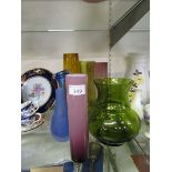 A selection of seven mid-20th century style glass vases to include thick orange glass vase, blue