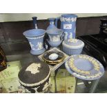 Selection of Wedgwood Jasperware items to include black lidded pot, cased cameo of roses, pin