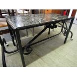 A black metal painted occasional table with black and green marble top