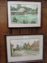 Two framed and glazed watercolours of village scenes