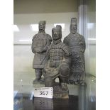 Three oriental terracotta warriors