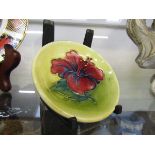 Small green glazed Moorcroft 'Hibiscus' pattern pin dish