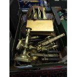 A tray of various metal and brassware to include candlesticks, cannons, etc