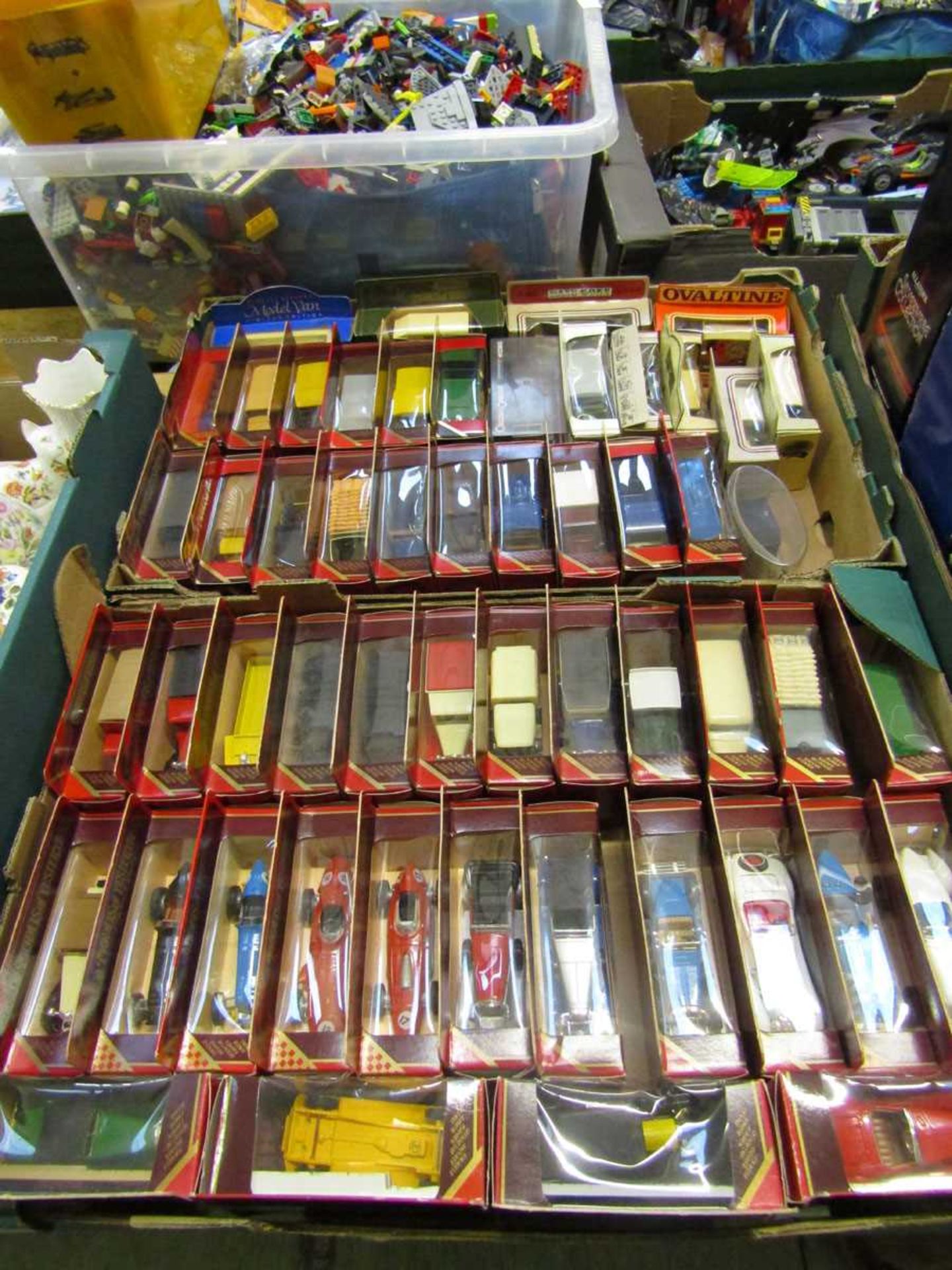 Two trays of boxed Yesteryear and other die cast cars and trucks