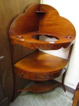 A Victorian mahogany corner washstand