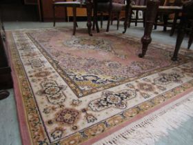 A modern pink rectangular rug