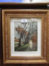 A gilt framed and glazed continental watercolour of wooded house scene, signed bottom right