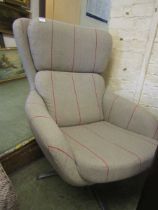 A mid-20th century possible Parker Knoll swivel chair upholstered in a beige and red striped