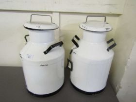 A pair of reproduction white painted metal milk churns