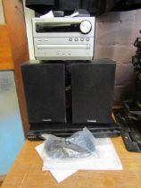 A Panasonic mini hi-fi system along with a Sony DVD player and a pair of Panasonic speakers