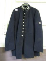 An early 20th century black jacket possibly from St Johns Ambulance