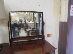 An early 20th century mahogany framed toilet mirror with bevel glass, overall width, 68.5cm