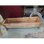 A hand crafted pine garden planter