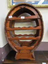 A barrel form wine rack, 65cm tall
