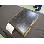 A Victorian leather bound photo album