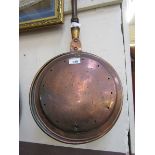 An 18th century copper warming pan, the lid engraved with a bird