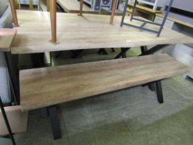 A modern oak effect picnic bench along with two matching bench seats