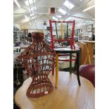 A multicoloured spindle back chair together with a wicker mannequin