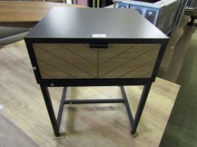 A modern black laminated bedside cabinet