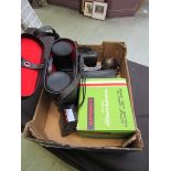 A box containing a pair of binoculars, battery operated coloured slide viewer, opera glasses,