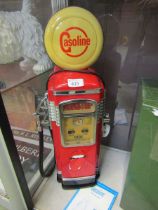 A modern reproduction radio/cassette player in the form of gasoline pump