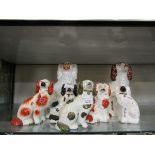 A selection of seven assorted single Staffordshire hearth dogs