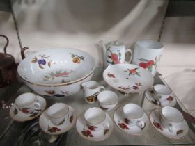 A selection of Royal Worcester 'Evesham' tableware to include serving bowl, cups, saucers, teapot,