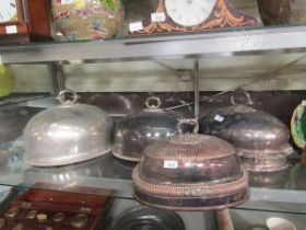 Four silver plated cloches