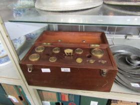 A pair of mahogany cased Burleigh balance scales along with a set of brass weights Maker's sticker :