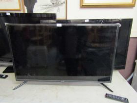A Samsung TV with remote