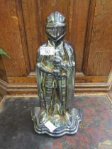 An early 20th century fireside companion set in the form of a knight