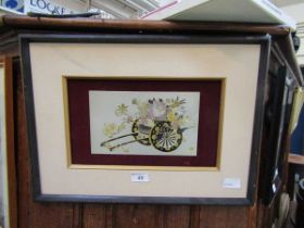 A gilt framed etching of flower cart