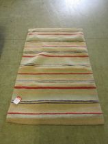 A modern rectangular striped rug