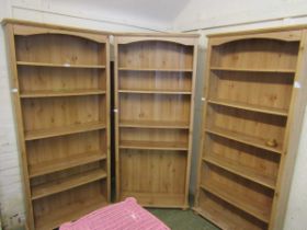 Three pine effect laminated full height bookcases