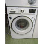 A Siemens washing machine Unsure of functionality, cannot plumb and test in saleroom. Inside