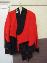 Two military red dress suits to include waistcoat, trousers, and jacket