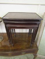 A nest of three reproduction mahogany occasional tables