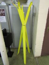 A modern yellow metalwork hat stand by Tolix