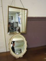 A cream and gilt painted ornate easel mirror together with a gilt painted rectangular wall mirror