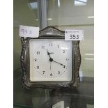A silver hallmarked framed quartz clock by Liberty