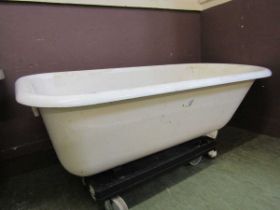 A white enamel cast iron bathtub