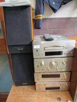 A Teac stacking unit comprising of CD player, integrated stereo amplifier, AM/FM stereo tuner, and a