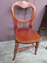 A Victorian stained wooden balloon back bedroom chair