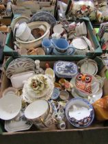 Two trays containing a selection of ceramic tableware to include Spode 'Blue Room' large cup,