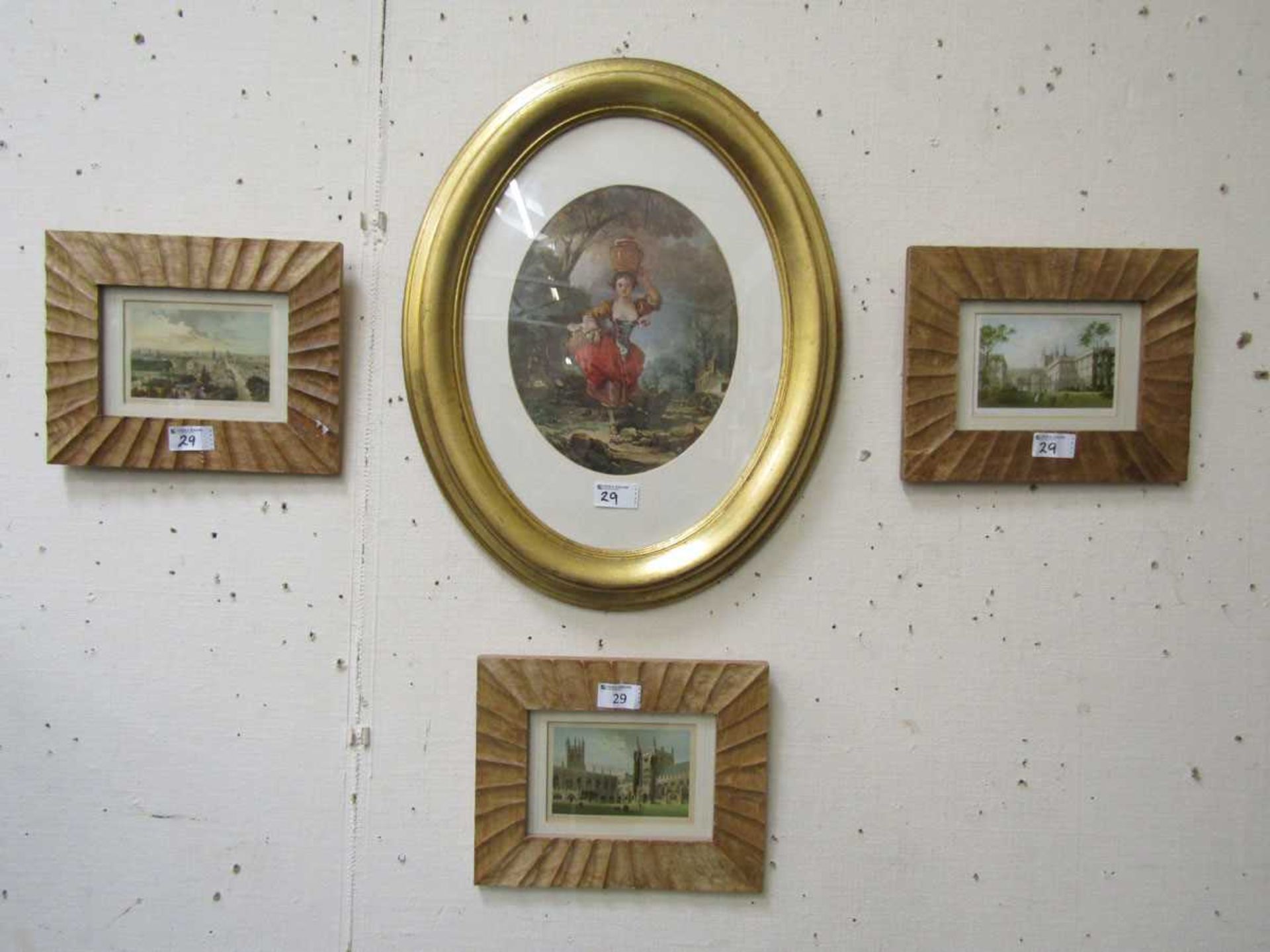 A gilt oval framed print of young lady together with three modern framed prints of church scenes