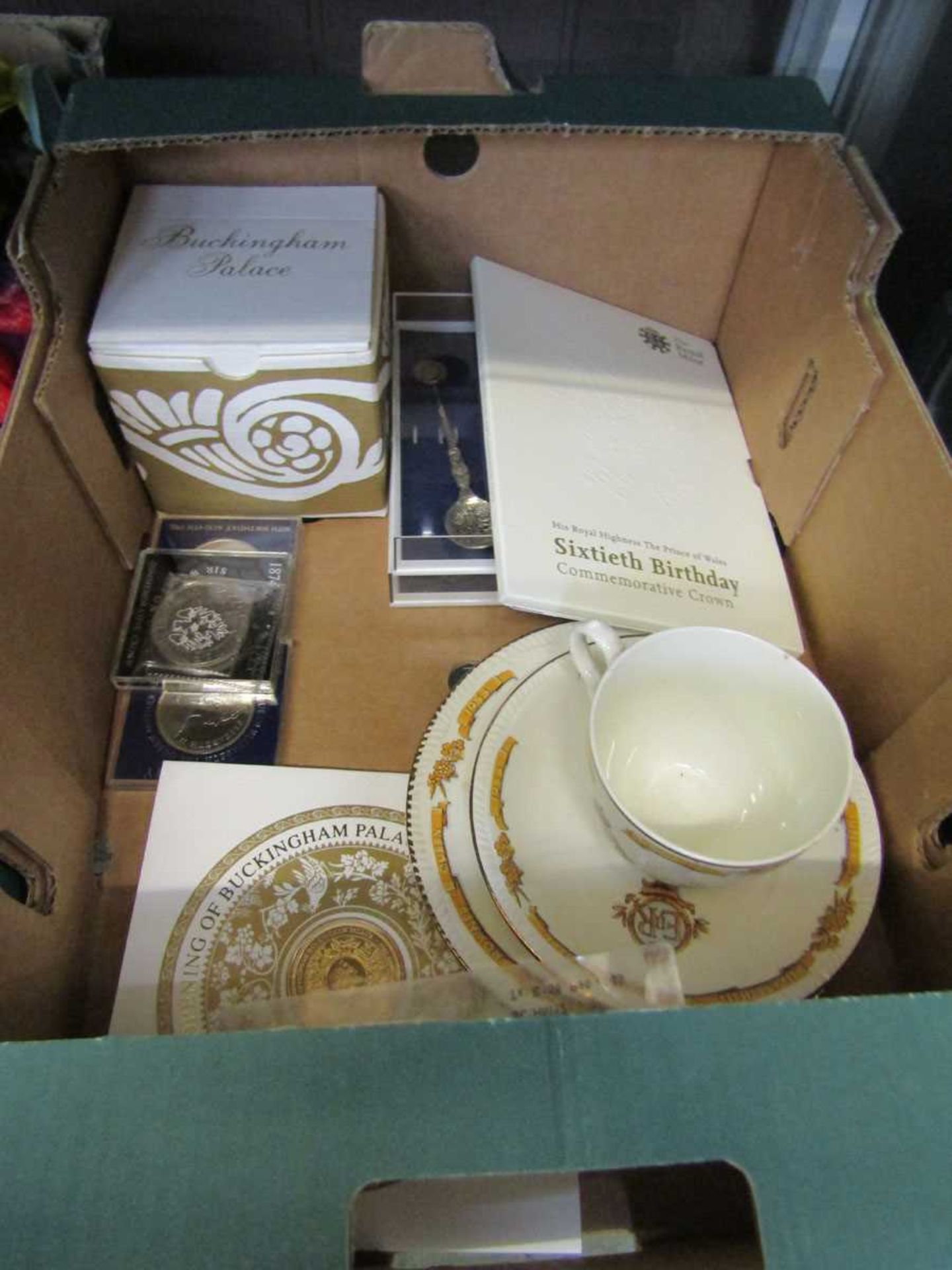 A carton containing a selection of Royal memorabilia to include Coronation trio, opening of