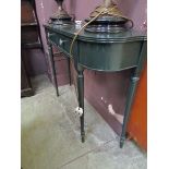 A reproduction Regency style green painted console table with two drawers