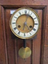 A mounted drop dial clock movement with enamelled face