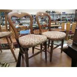 A pair of late Victorian balloon back bedroom chairs